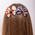 zestaw dwoch spinek do wlosow z jedwabnymi kokardkami arko cyrk spadiora